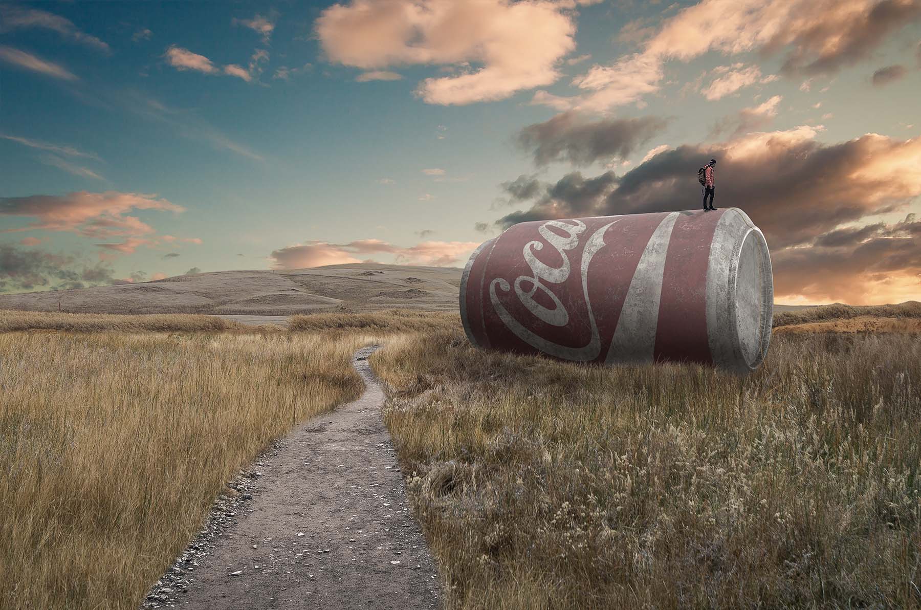 Online design of a giant coca cola on a field.